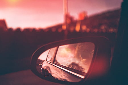 Close-Up Photography of Side Mirror During Dawn thumbnail