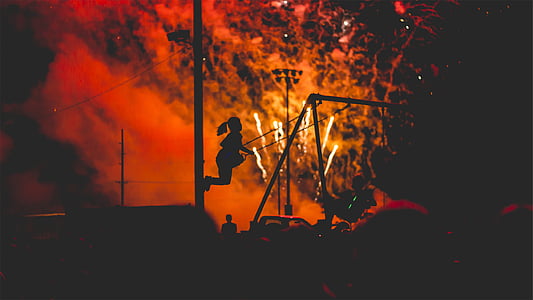silhouette of girl on swing thumbnail
