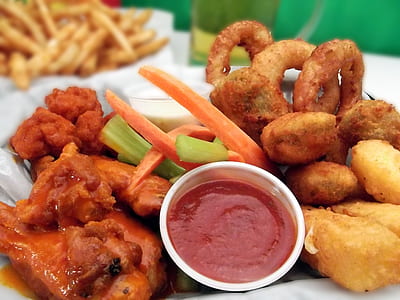 fried food with sauce on white ceramic plate thumbnail