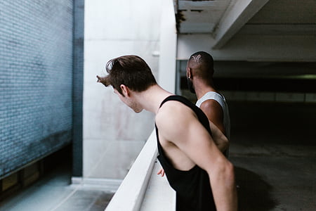 man leaning on the wall thumbnail