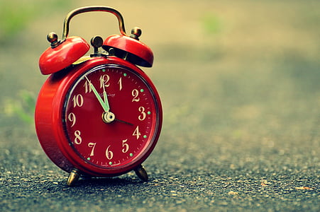 round red analog alarm clock thumbnail