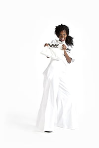 woman holding white paper thumbnail