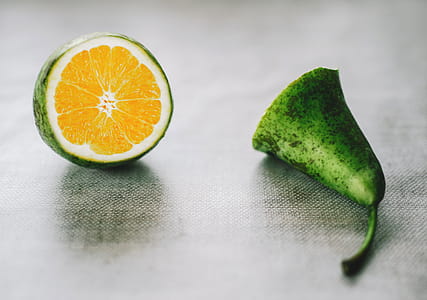 Green Citrus Fruit on Gray Surface thumbnail