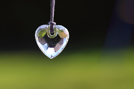 macro shot of clear gemstone heart pendant thumbnail