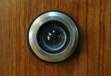 round gray and black door lens thumbnail