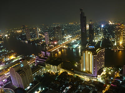 aerial photography of city at night time thumbnail