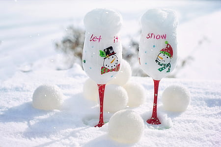 two clear wine glass with snows thumbnail