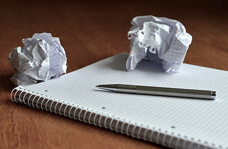 gray click pen on notebook thumbnail