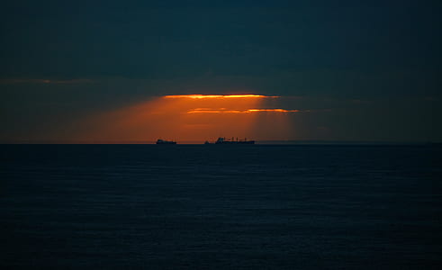 ship in the middle on ocean thumbnail