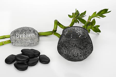 black polished stones and glass vase thumbnail