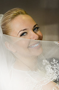 woman in white lace wedding dress thumbnail