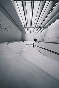 man walking inside building thumbnail