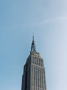 white painted building during daytime thumbnail