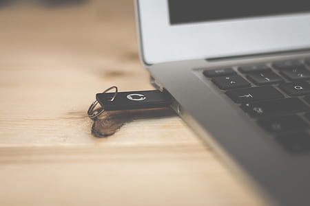 USB flash drive mounted on laptop thumbnail
