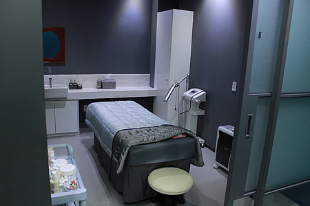 gray and black bed beside gray racl thumbnail