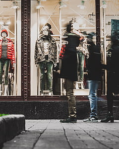 people standing beside store thumbnail