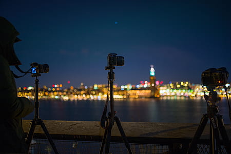 Tilt Shift Lens Photography of Camera With Tripod thumbnail