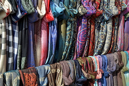 hanging assorted-colored scarves thumbnail