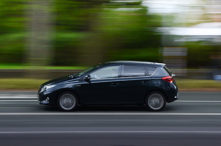 black SUV running on road in selective focus photography thumbnail