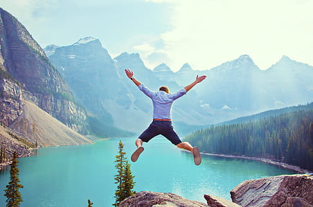 man jumping from rock thumbnail
