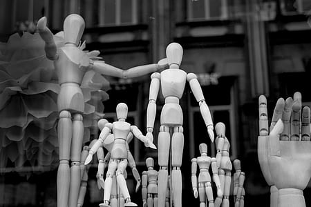 grayscale brown wooden action figure thumbnail