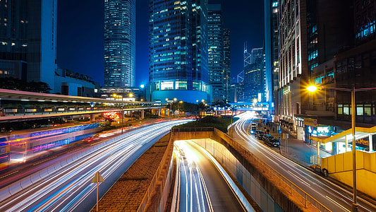Lighted Up Roads at Night with skyscrapers in Hong Kong, China thumbnail
