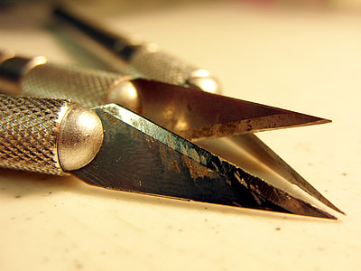 focus photo of art knives thumbnail