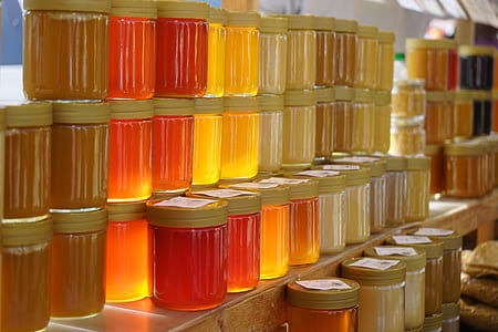 clear glass jar lot on brown shelf thumbnail
