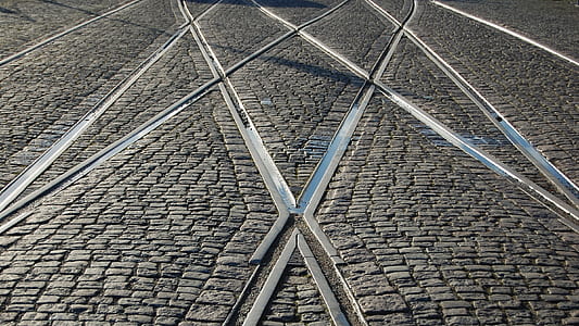 landscape photography of brick flooring with canal thumbnail
