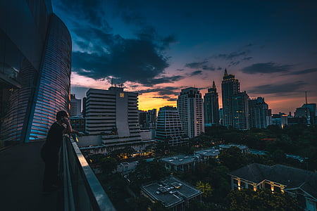 aerial view of cityscape during golden hour thumbnail
