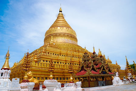 gold temple under blue sky thumbnail
