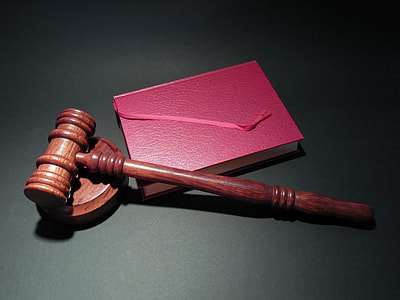 brown wooden mallet with red book thumbnail