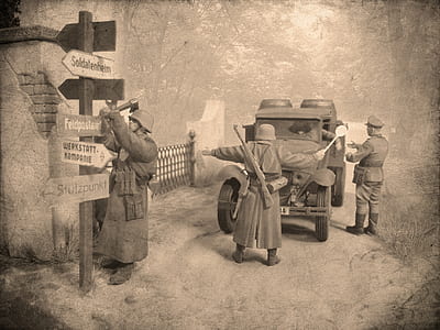 three armies standing near car and fence thumbnail