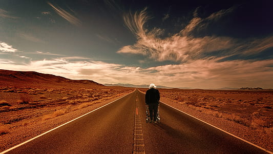 person walking on road thumbnail