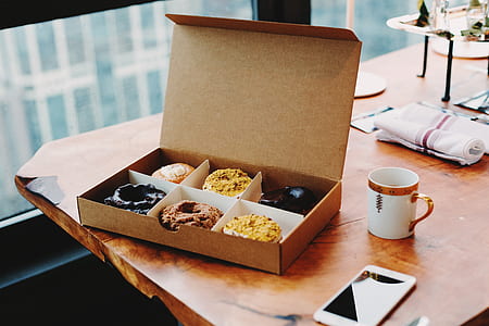 six variety of doughnuts in box thumbnail