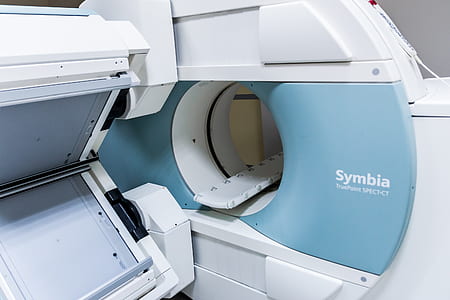 white and blue Symbia magnetic resonance imaging machine thumbnail