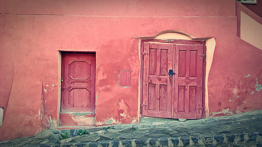 closed brown wooden door thumbnail