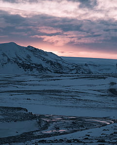 landscape photography of mountain covered by snow thumbnail