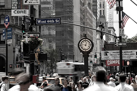 grayscale photo of people crossing on streets thumbnail