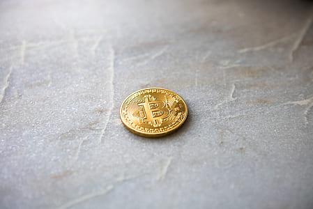 closeup photo of Bitcoin coin on surface thumbnail