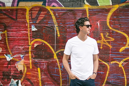 man wearing white v-neck t-shirt facing right direction thumbnail