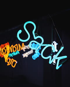 teal sack neon light inside dim room thumbnail