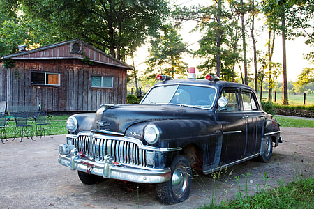 parked classic black Beetle coupe thumbnail