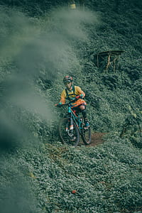 man riding mountain bike thumbnail