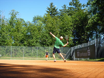 man wearing green shirt and black shorts thumbnail