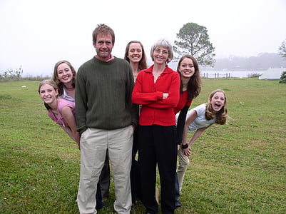 people standing on green grass field thumbnail