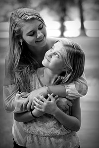 monochrome photography of two women thumbnail