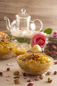 noodles in bowl on top of table thumbnail
