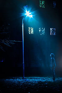 person under the street light thumbnail