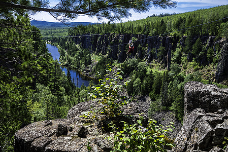 Guy Ziplining down Eagle Canyon, Ontario, Canada thumbnail